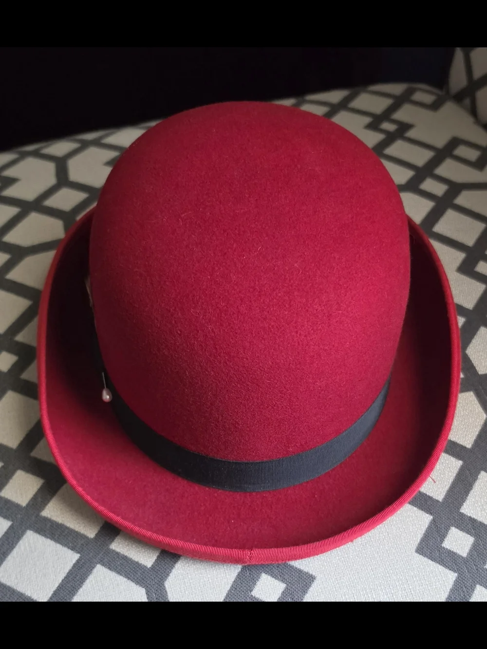 Men's Red Wool Bowler Hat with Black Band and Feather Accent
